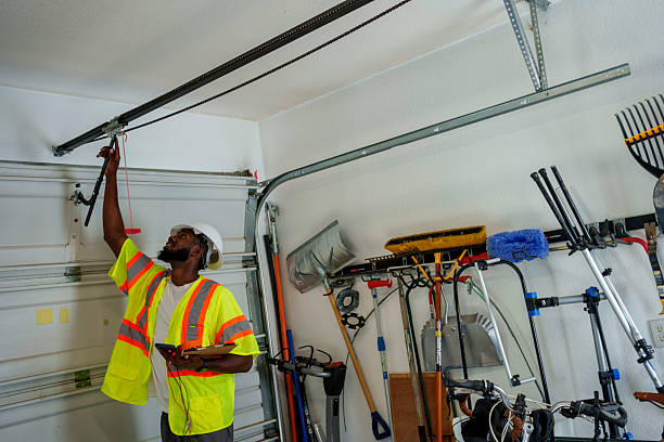 Professional Garage Door Roller Replacement technician working in Everett, PA